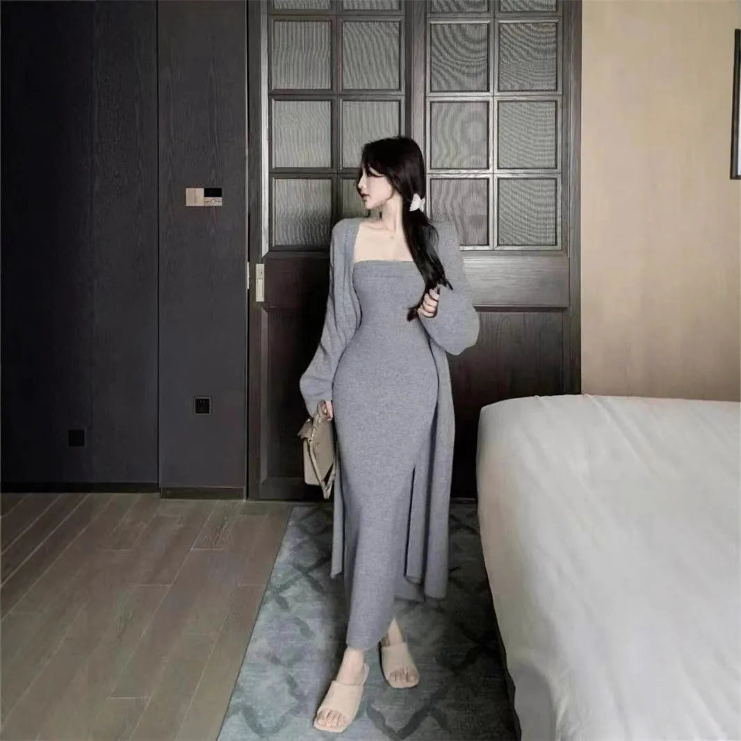 Women's grey knitted long sleeve cardigan and dress co-ord set with flocking detail on a hanger.