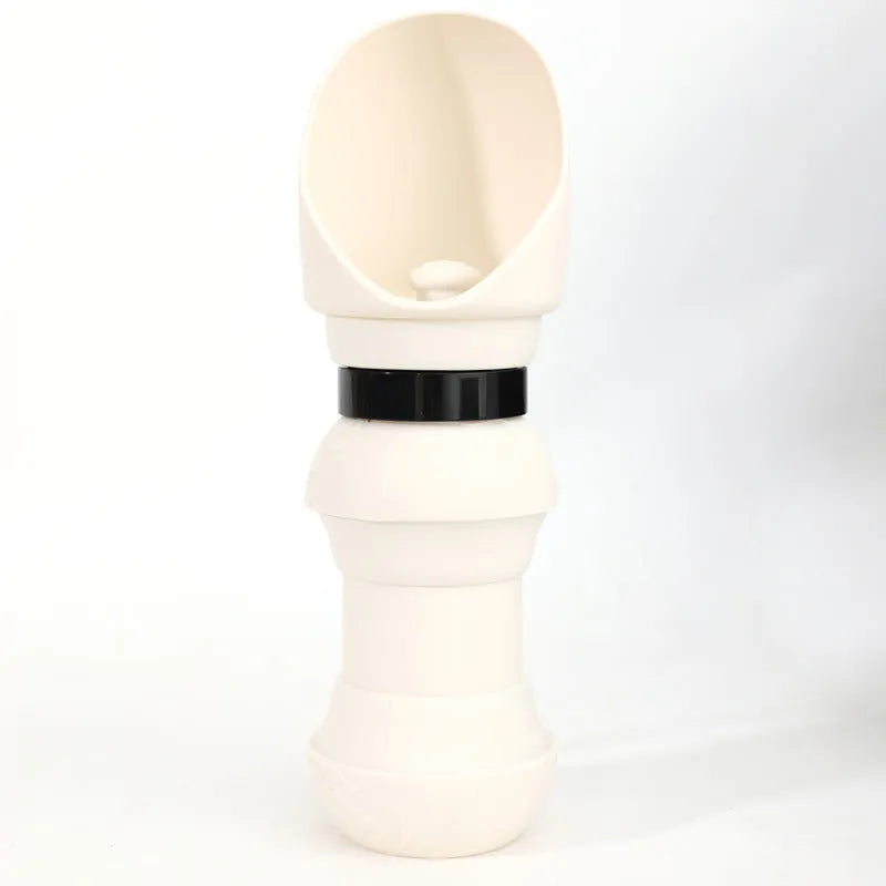 Collapsed and unfolded views of a silicone pet folding water cup in mint green, showing its portable design for dogs and cats.