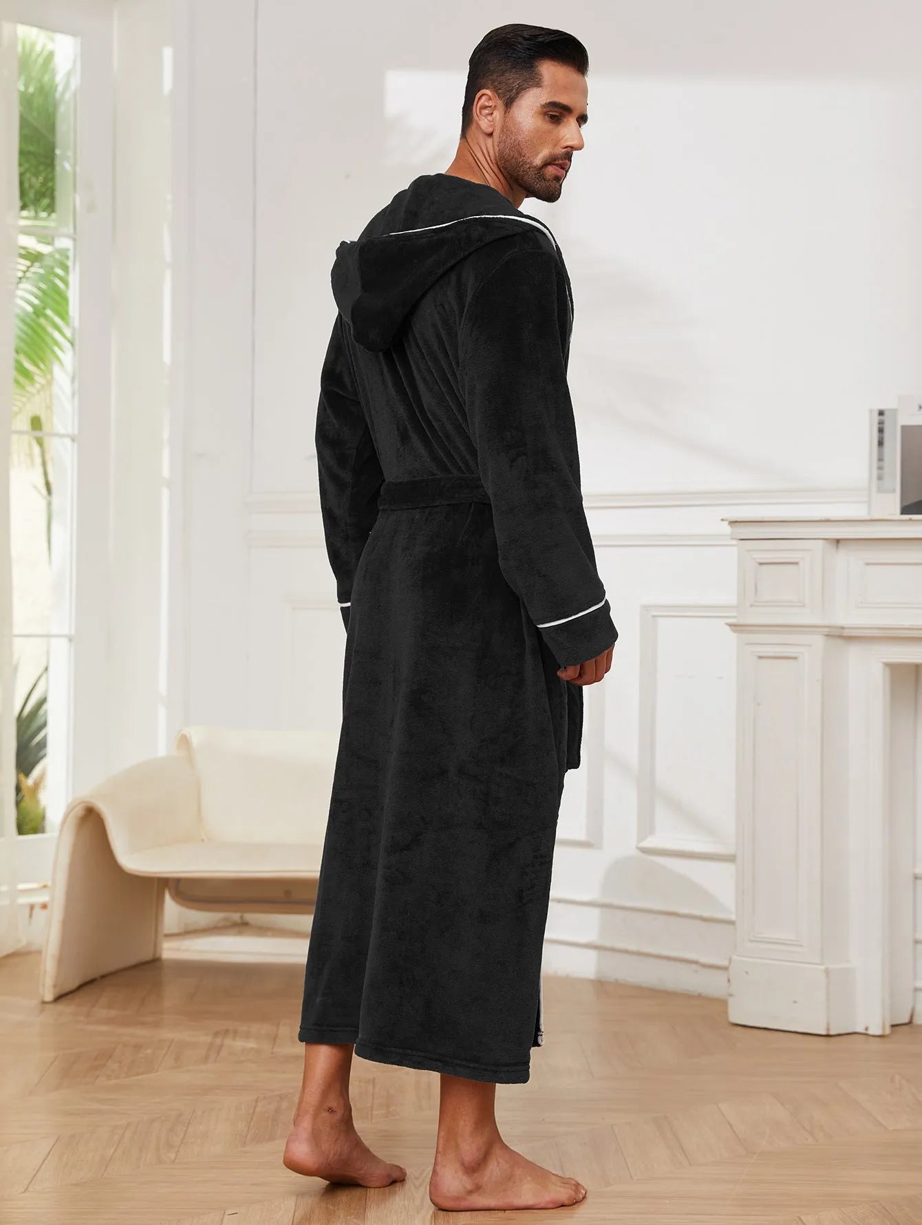 Men's grey flannel bathrobe with front tie belt, shown folded, for winter loungewear.