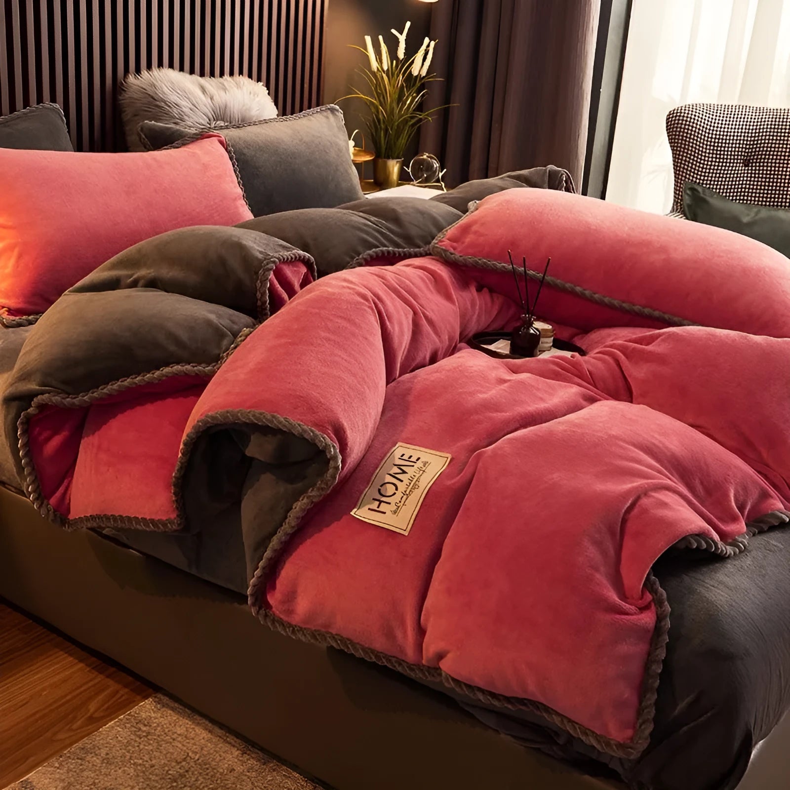 Solid colour coral fleece and velvet duvet cover in Burgundy style on a single bed.