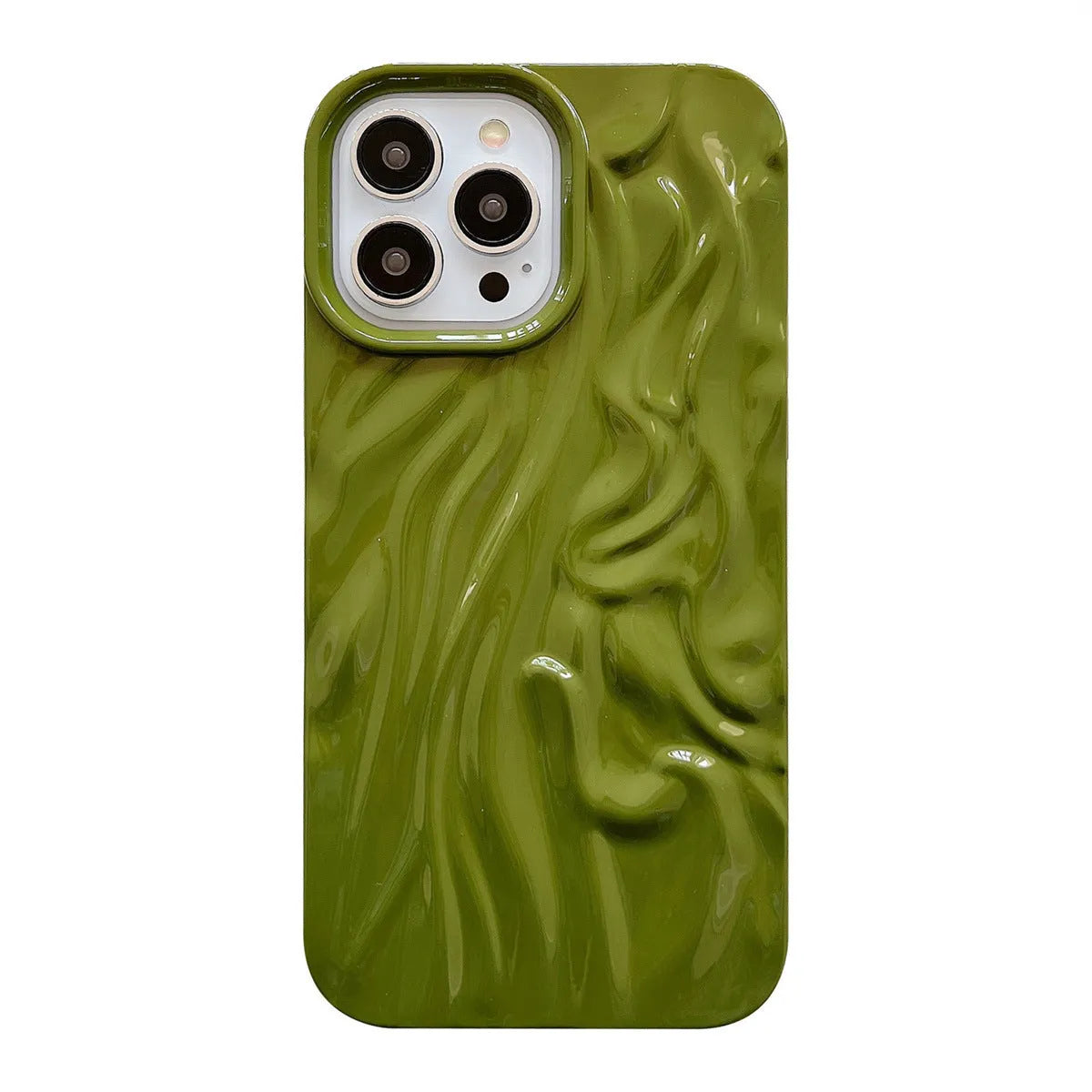 Solid colour water ripple texture silicone case for iPhone on a table.