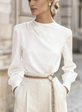Women's solid colour pleated high-neck lantern sleeve blouse in polyester fabric, available in Black, Navy, Apricot, White