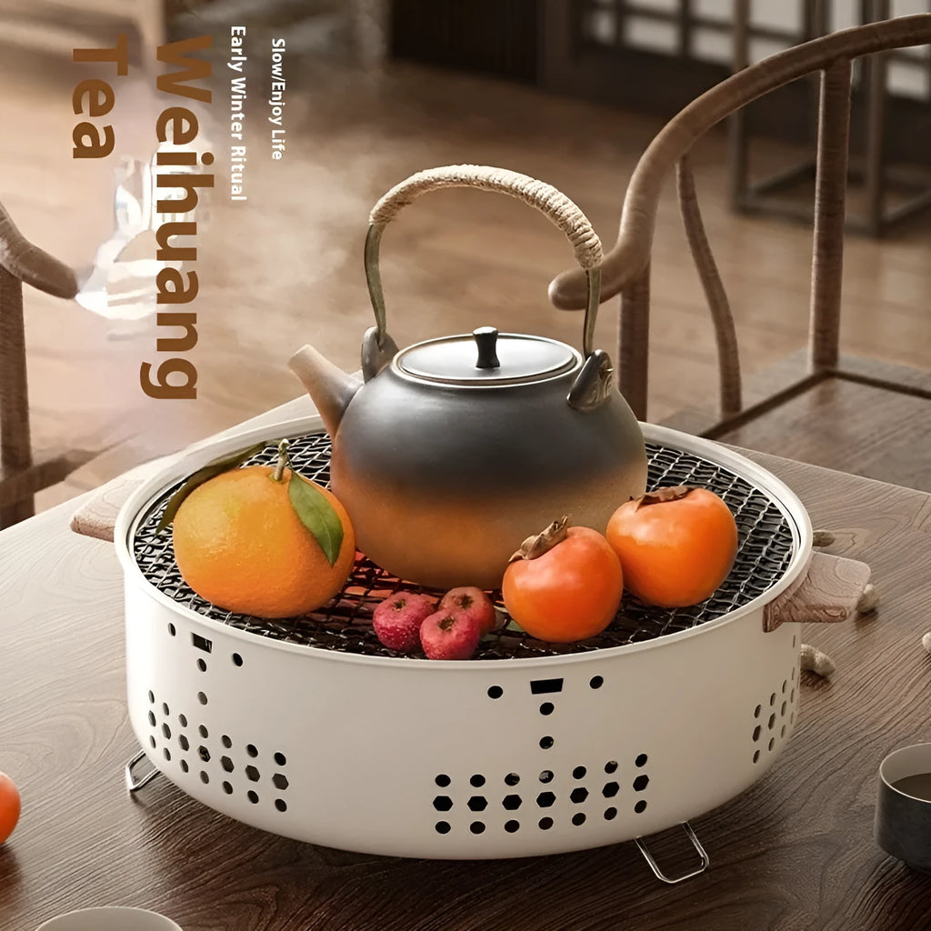 Modern portable charcoal cooking stove with integrated metal grill rack, for indoor use by 3-5 people.