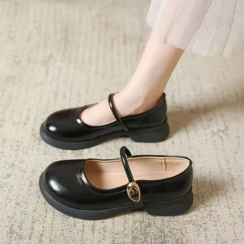 Black flat leather shoes with skull pattern, wedge heel, and round toe for cheongsam outfits