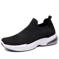 Breathable mesh slip-on lazy sock shoes in black, pink, khaki, and white colours on a PVC sole.