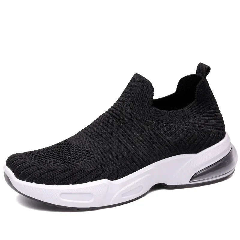 Breathable mesh slip-on lazy sock shoes in black, pink, khaki, and white colours on a PVC sole.