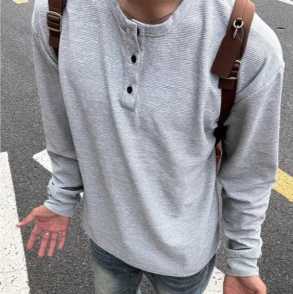 Black American Henry collar long-sleeved men's pullover top, loose fit, solid colour, polyester blend fabric