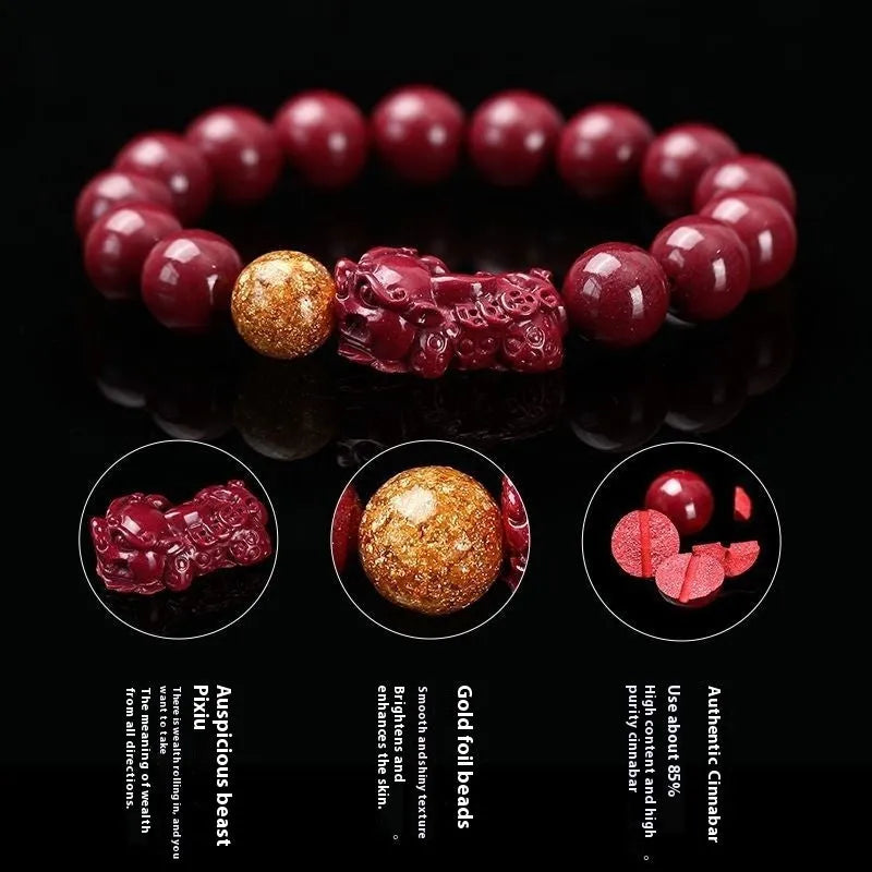 Polished purple and gold sandstone cinnabar bracelet with totem design on a wrist.