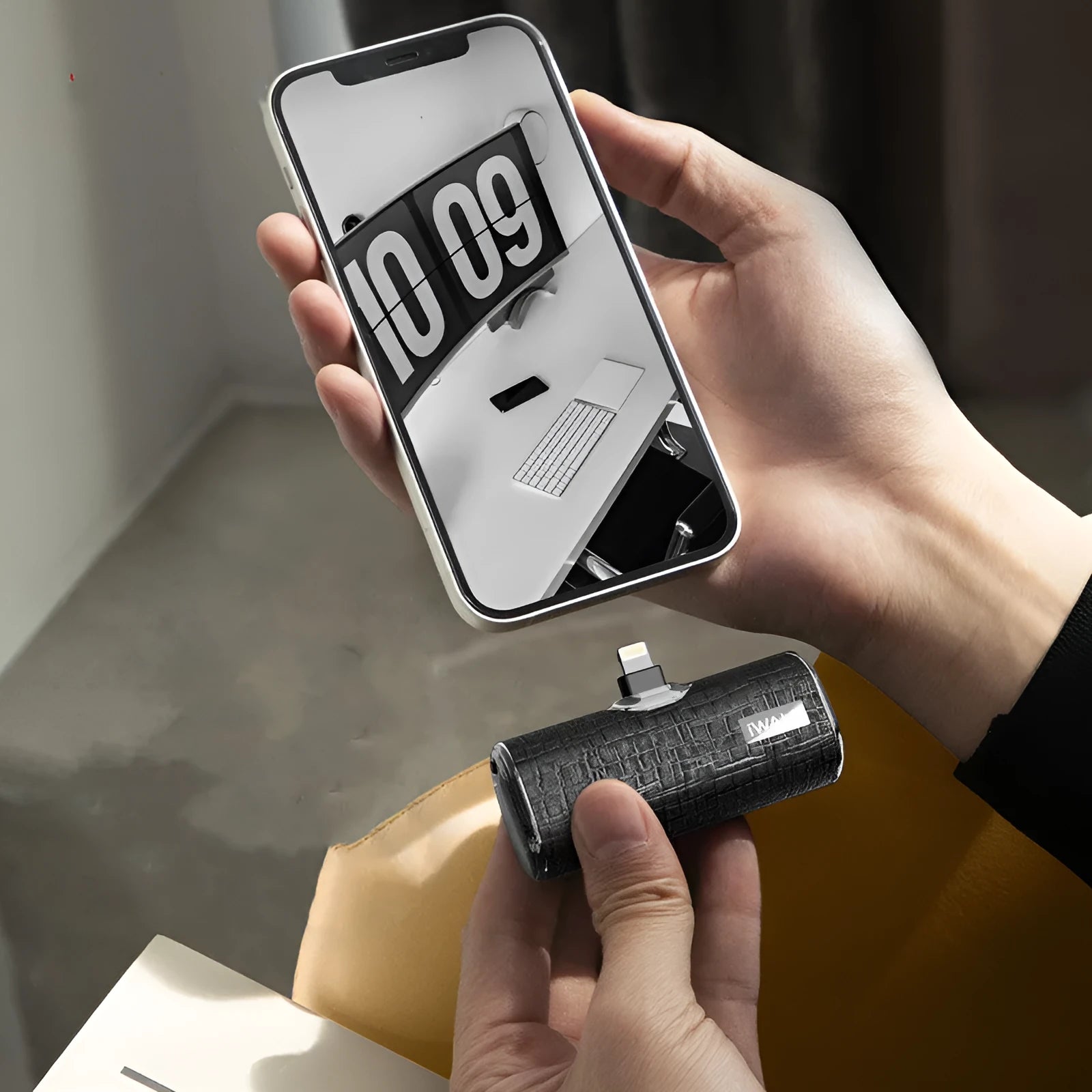 Black pocket leather power bank with lipstick design, 2700mAh capacity, compact size