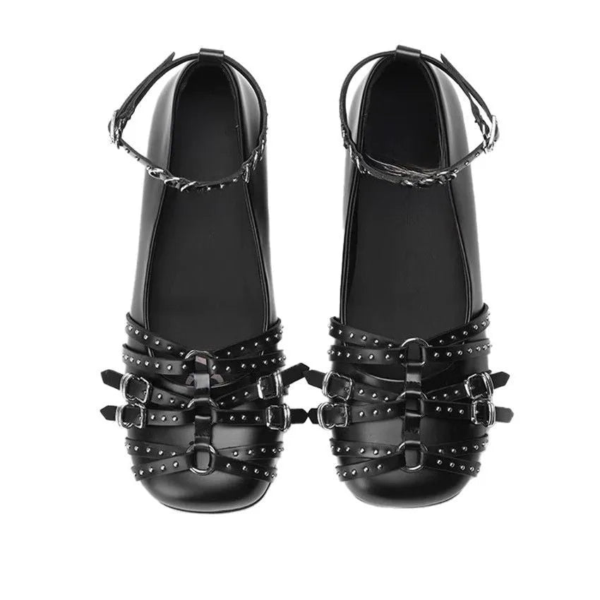 Women's black retro leather pumps with a square toe and silver buckle fastening.
