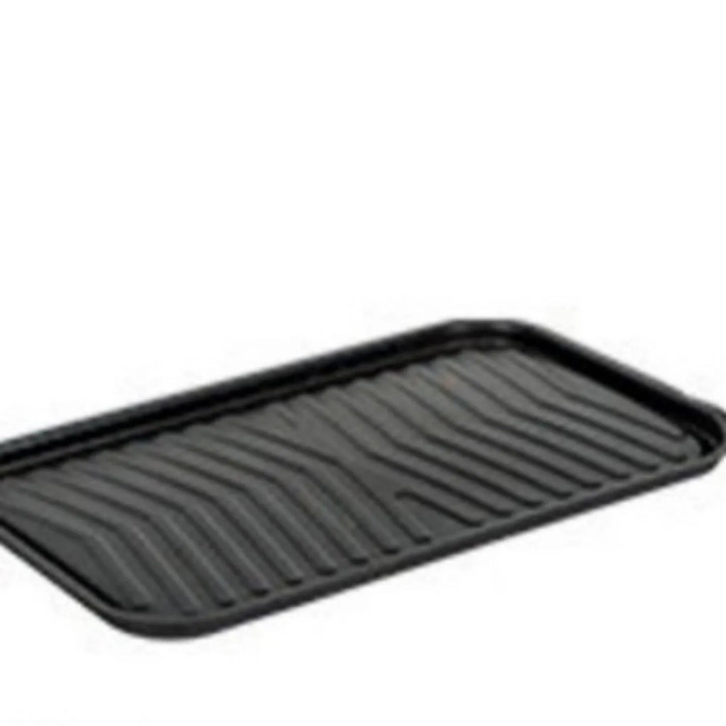 White round portable folding chimney grill with two carbon tanks and mesh grills on grass