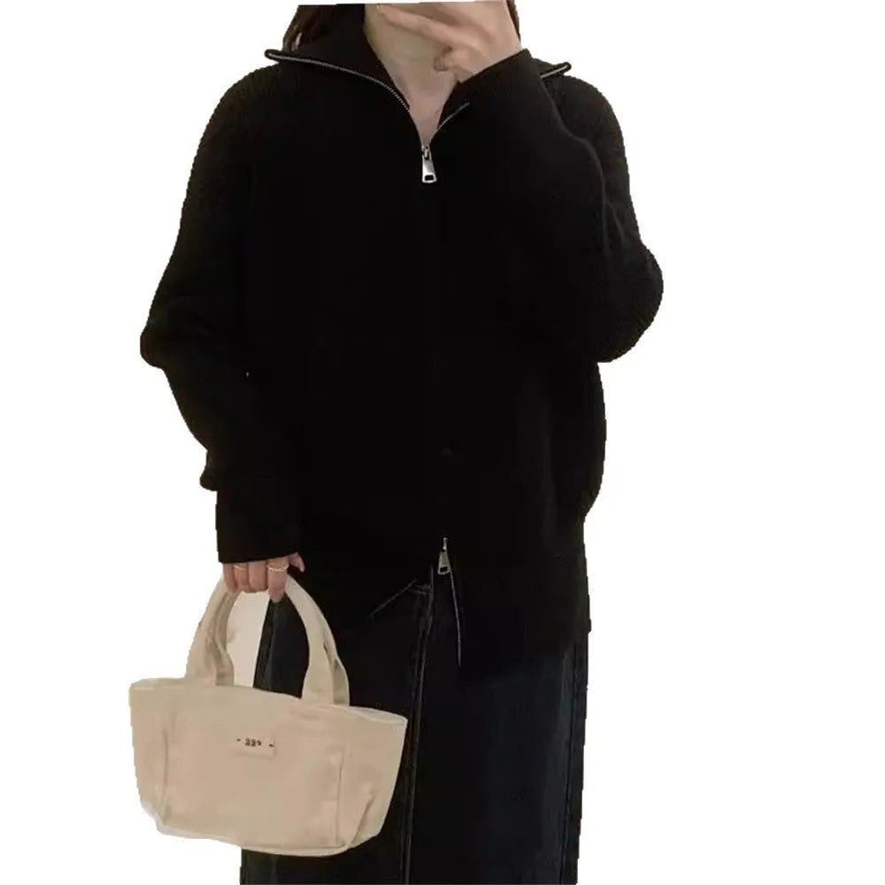 Hong Kong style grey double zipper knitted cardigan jacket with a floral pattern, shown on a model.