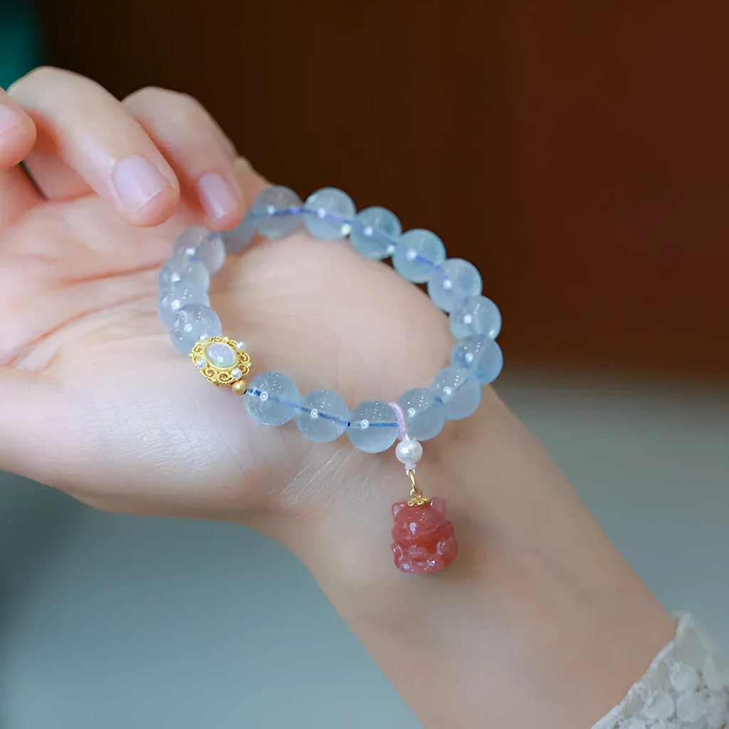 Aquamarine beaded bracelet with Chinese fengjiu fox charm in pearl or pink crystal colour variations