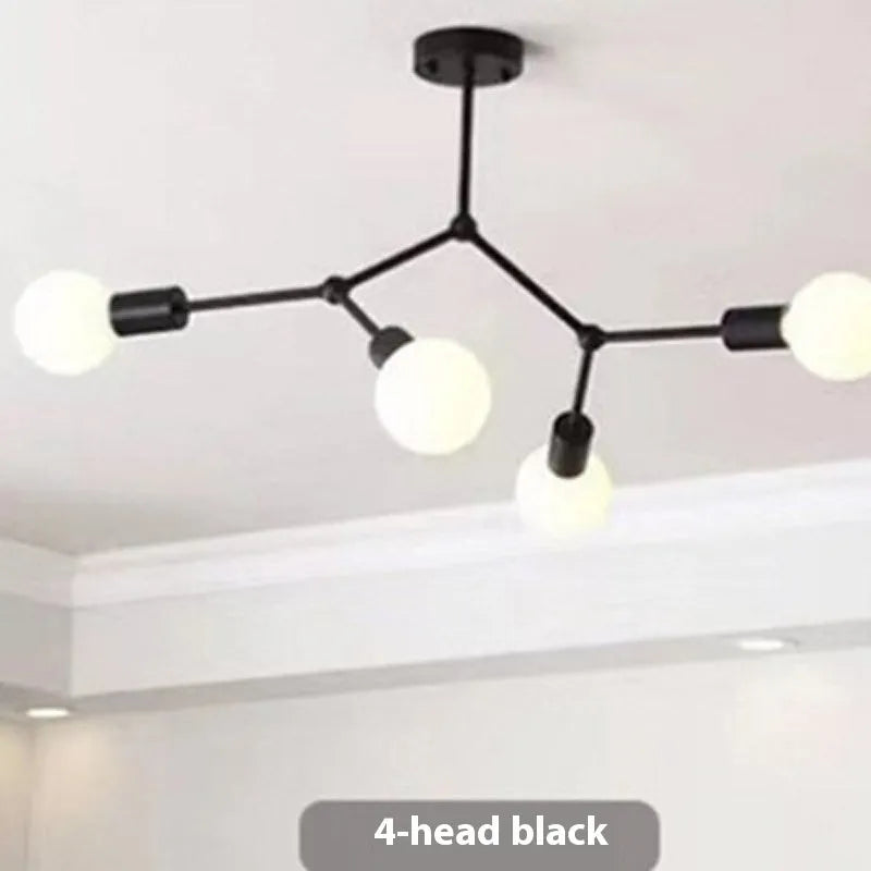 Nordic style black iron chandelier with multiple lights hanging from a ceiling