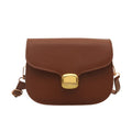 Simple PU handbag for women in one of six colours, showing interior with zippered change purse and phone pocket.