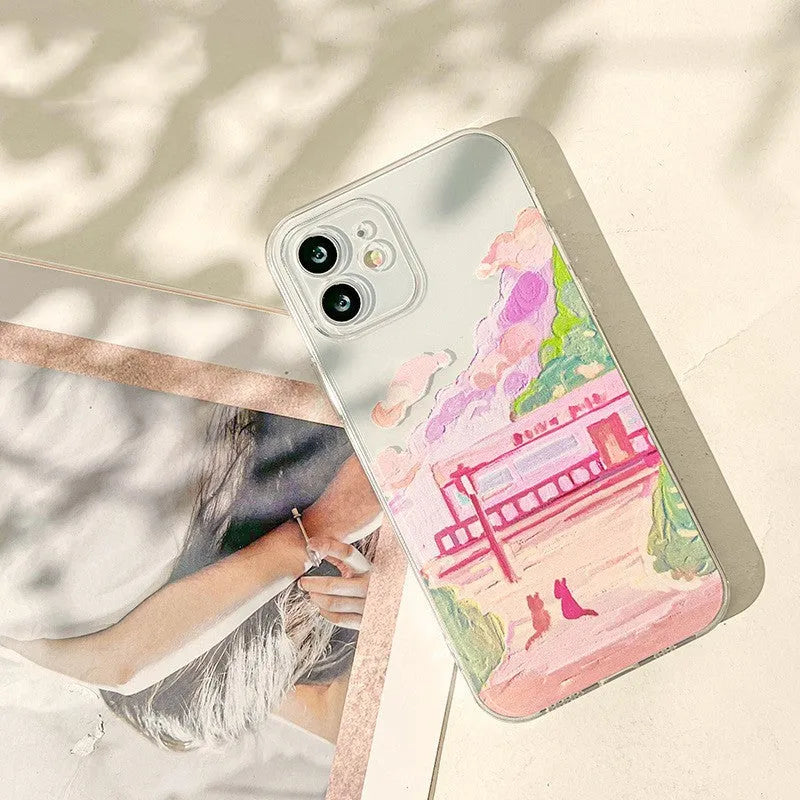 Soft silicone iPhone case with a colour-painted two cat cartoon design on the back.