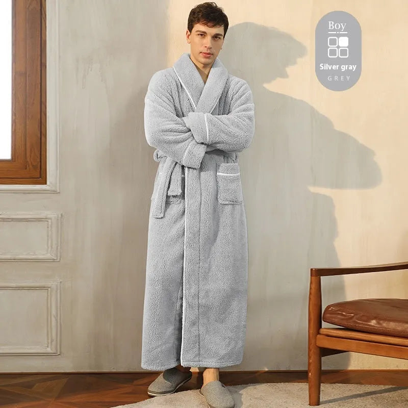A man and woman wearing matching heavyweight navy blue flannel bathrobes, a couple's winter nightgown set.