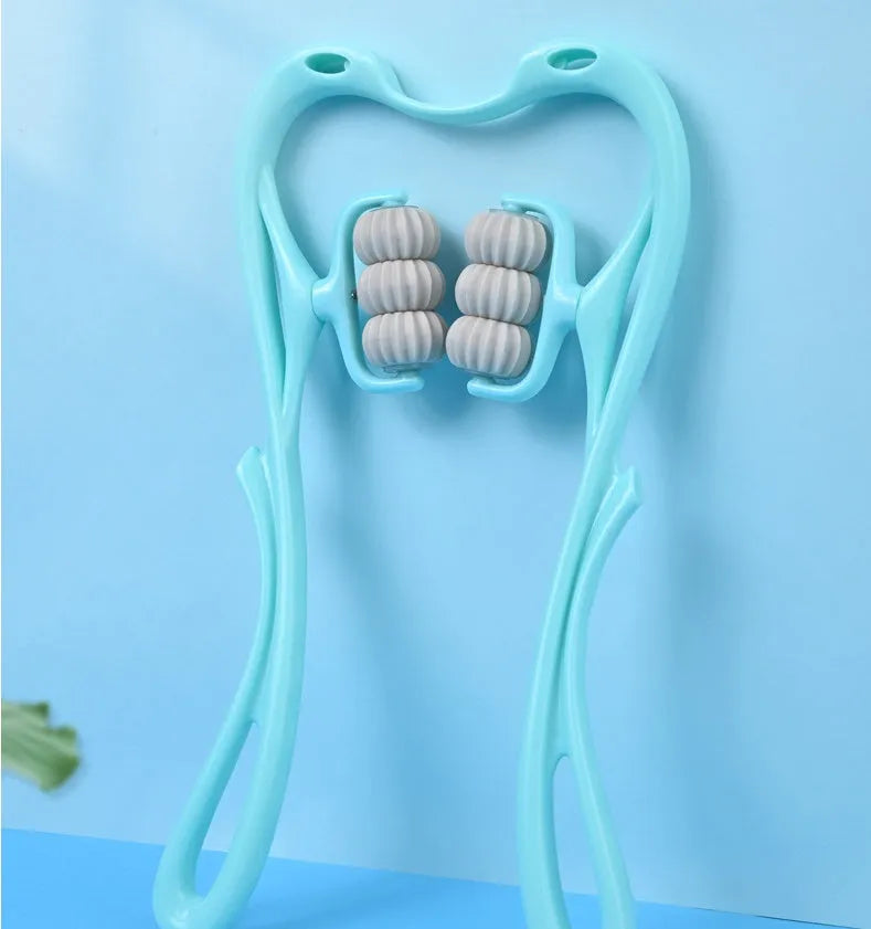 Blue swan-shaped manual six-wheel neck massager with rotating balls and a white crystal jade scraping board on a table.