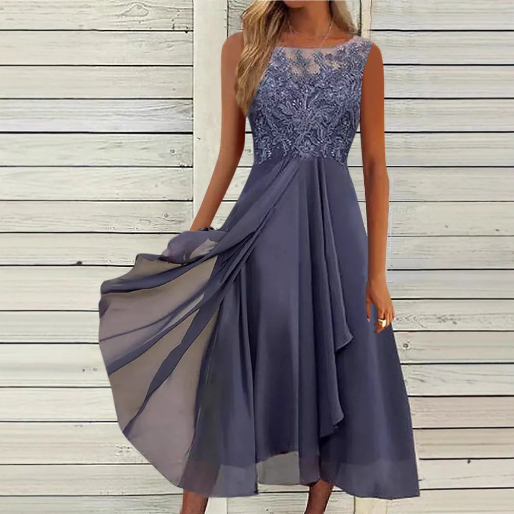 Women's sleeveless green chiffon dress with hollow-out lace detail, mid-length skirt.