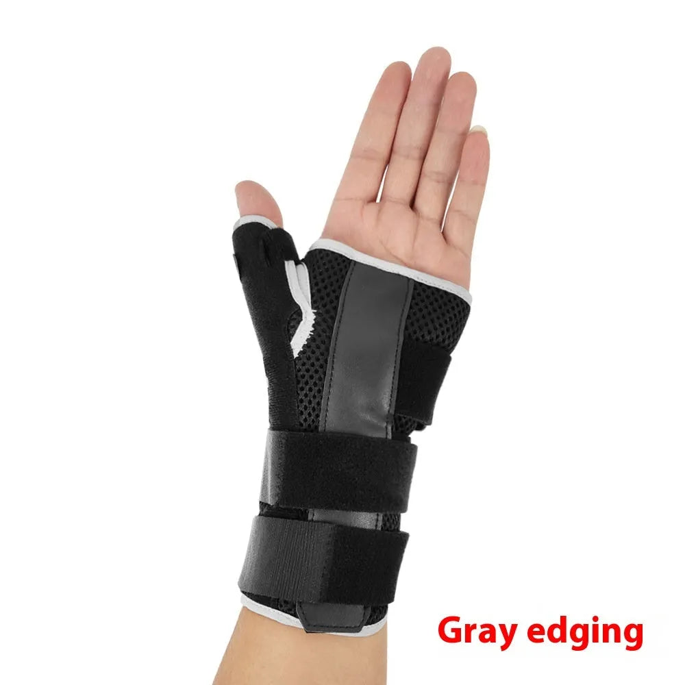 Carbon fibre sports wrist guard with thumb strap in black and grey, shown for left hand.