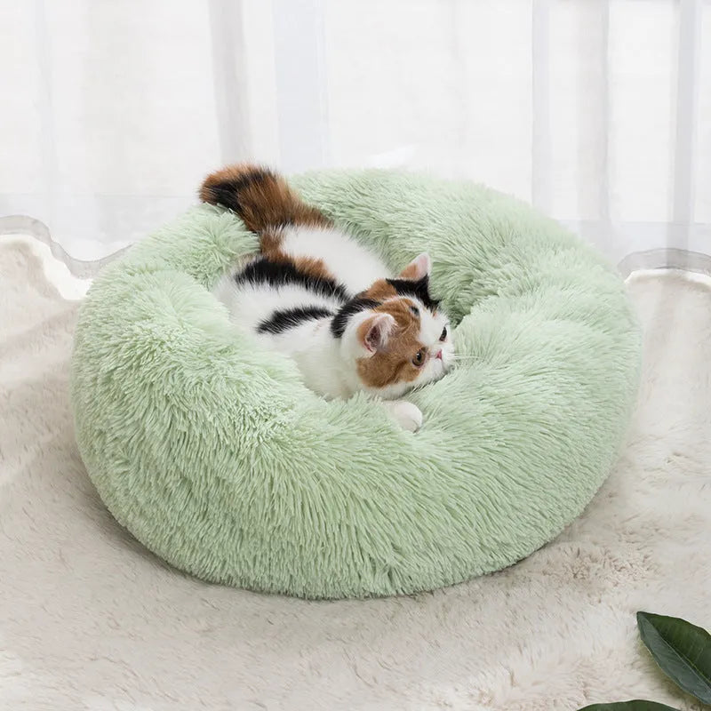 Round cloth cat bed in winter warm design, available in 30cm to 100cm diameters and six colours.