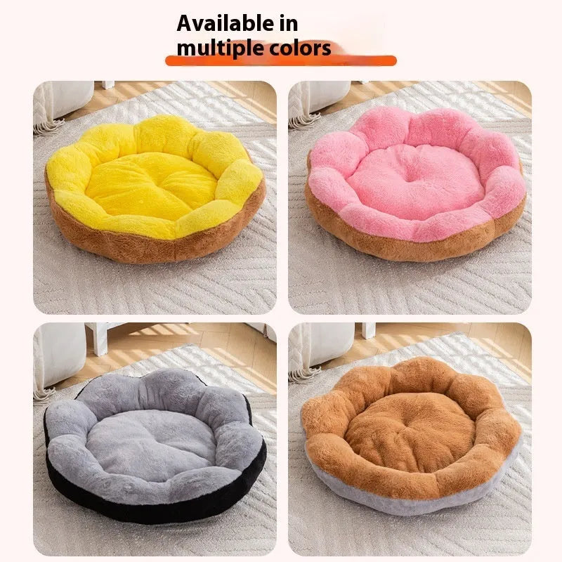 Round plush cat bed with detachable inner nest in grey and black, showing raised sides and soft texture.