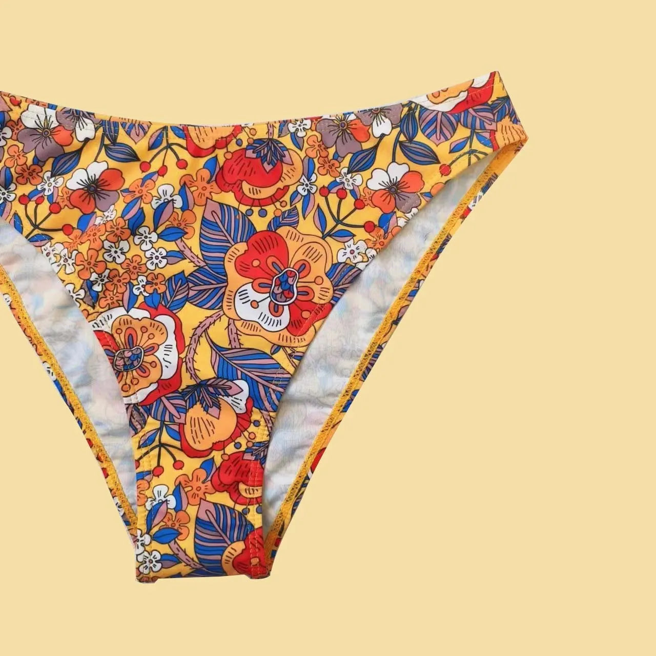 Plus size floral print women's bikini swimsuit with adjustable straps.