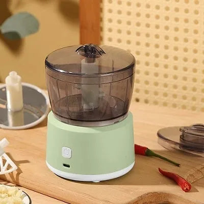 Mini electric meat grinder in white or light green with transparent 225ml cup and stainless steel blades