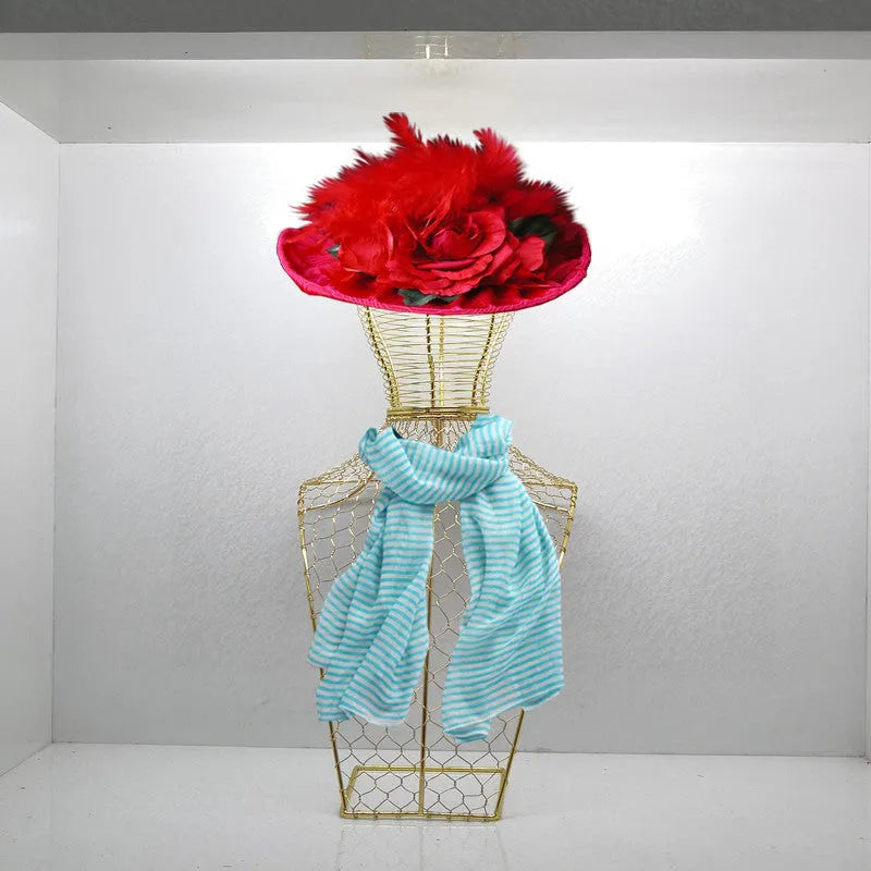Artistic wrought iron half-length ornament rack in black with jewellery and hat displayed
