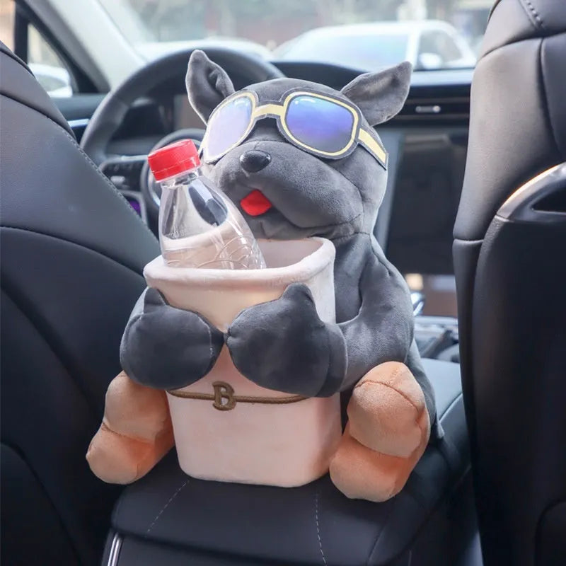 Car tissue box with plush fabric and dog designs hanging from vehicle armrest
