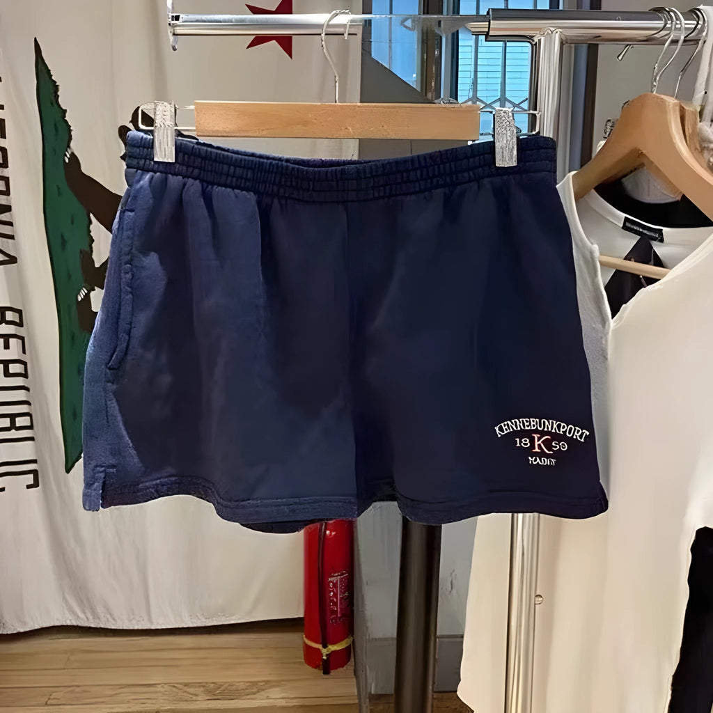 Women's dark blue cotton high top sports shorts with white flag embroidery and adjustable side ties
