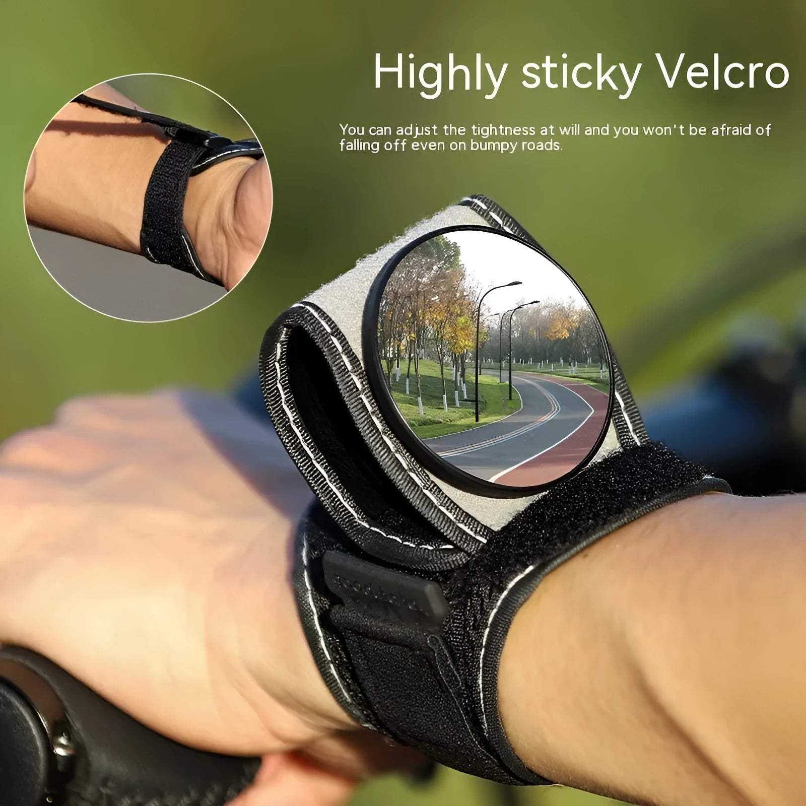 Black nylon bicycle rear-view mirror shown mounted on a cyclist's wrist.
