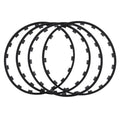 Set of four white nylon wheel hub protection rings for alloy wheels on a grey background.