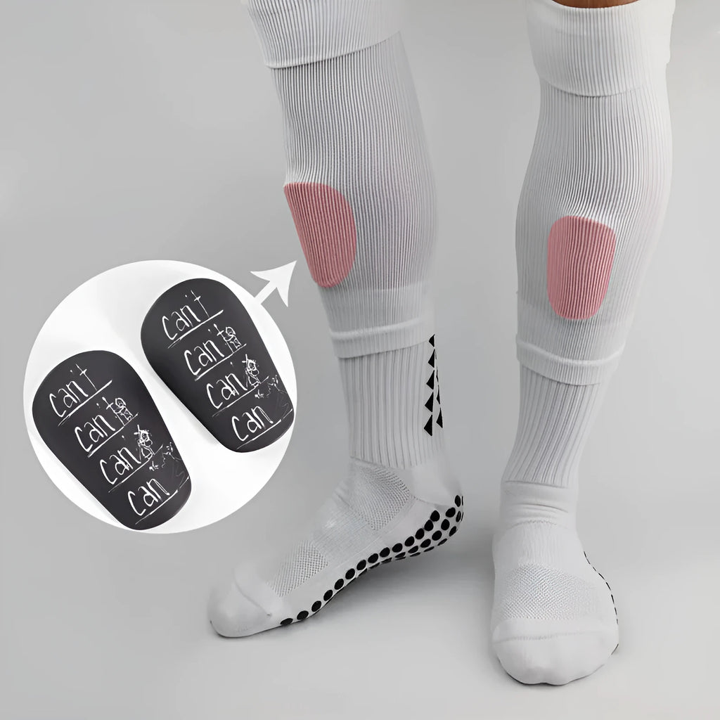 Football training shin guards in PU material showing black, blue, white, and white-black colour options