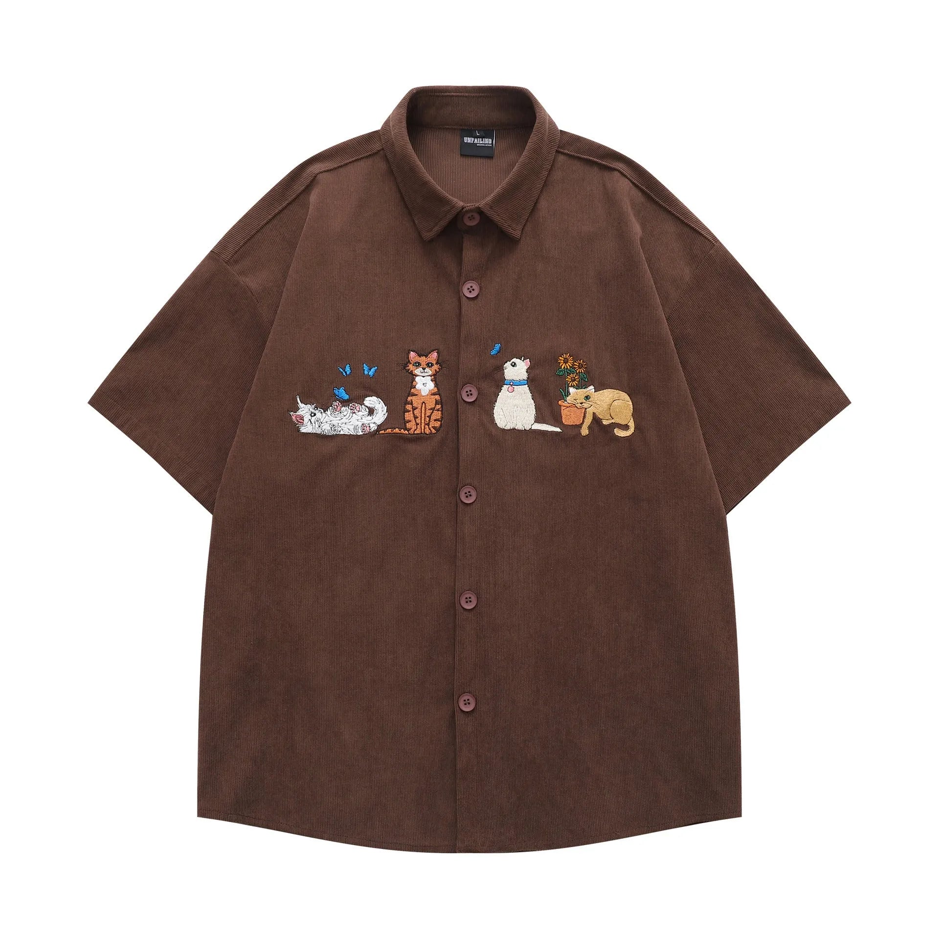 Loose shirt cardigan with embroidered cartoon pattern in apricot, brown, and black colours