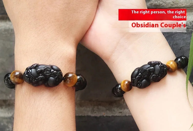 Black obsidian crystal Pi Xiu bracelet with ethnic styling and spiritual symbolism