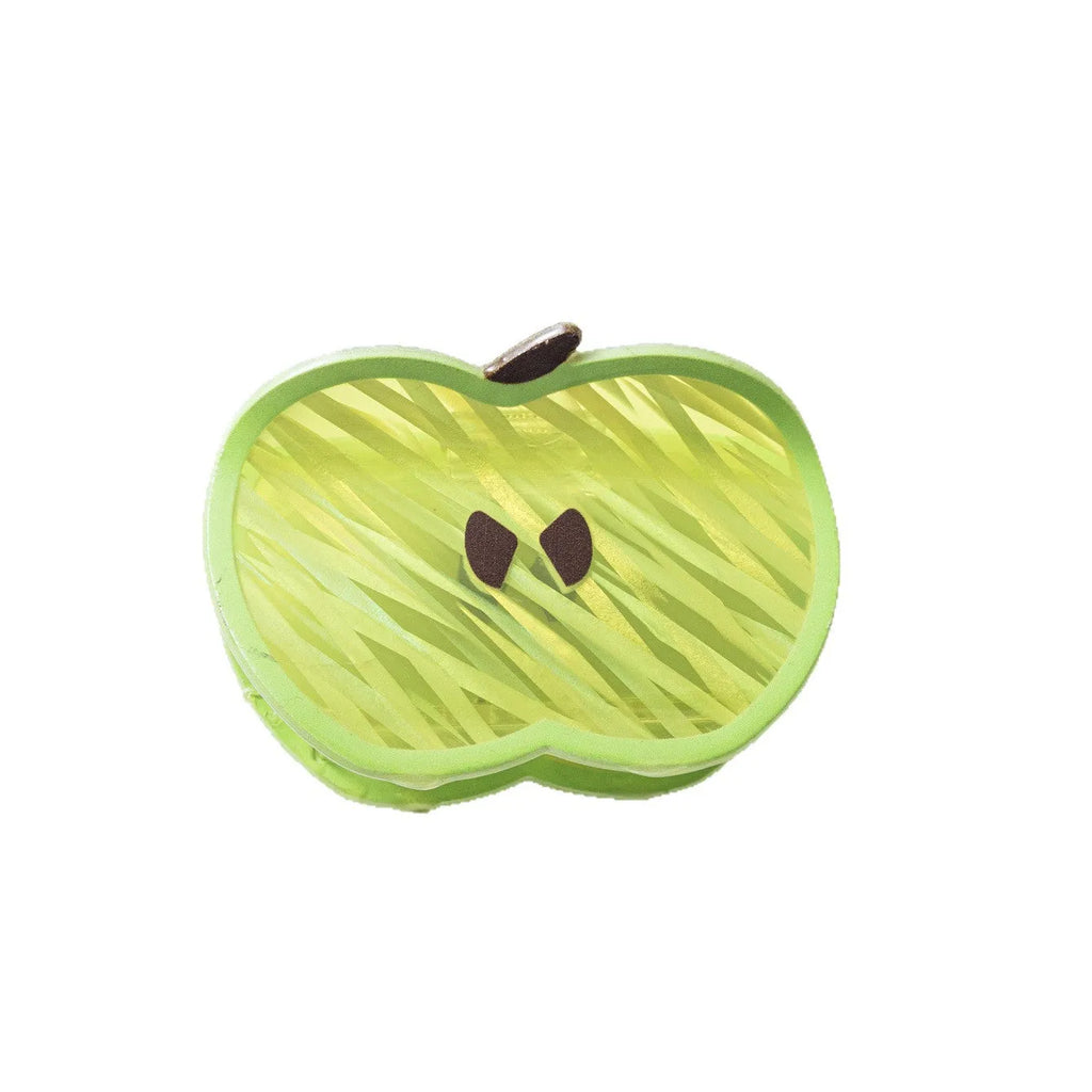 Green apple-shaped claw clip with polished PVC finish, 7.5cm long, on a plain background