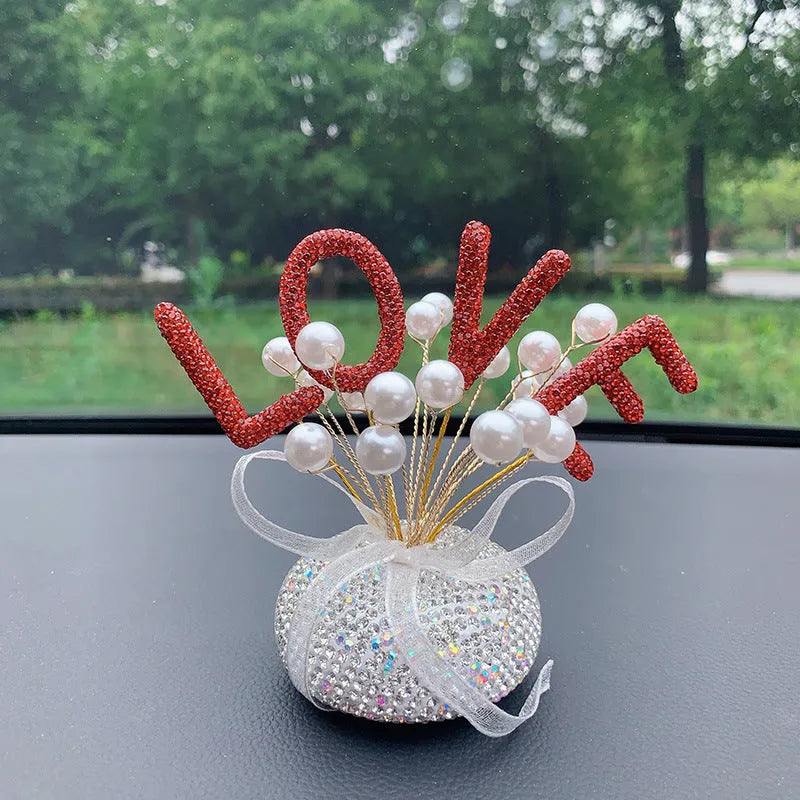 Clay star car decoration ornament for centre console in various red, pink, and pearl white colour designs.