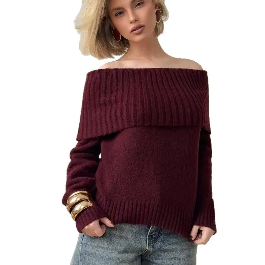 Grey off-the-shoulder sweater with a 3D pattern and strapless design on a model.