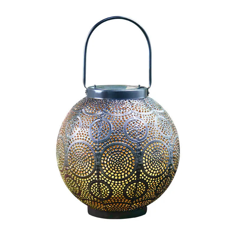 Solar powered outdoor courtyard lamp with decorative iron hollow design and integrated solar panel