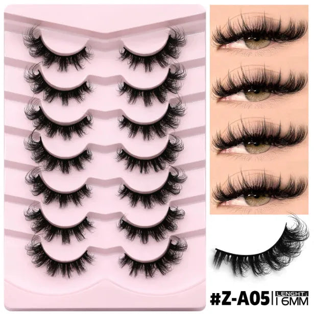 Box of artificial fibre false eyelashes in a natural long thick style with adhesive glue.