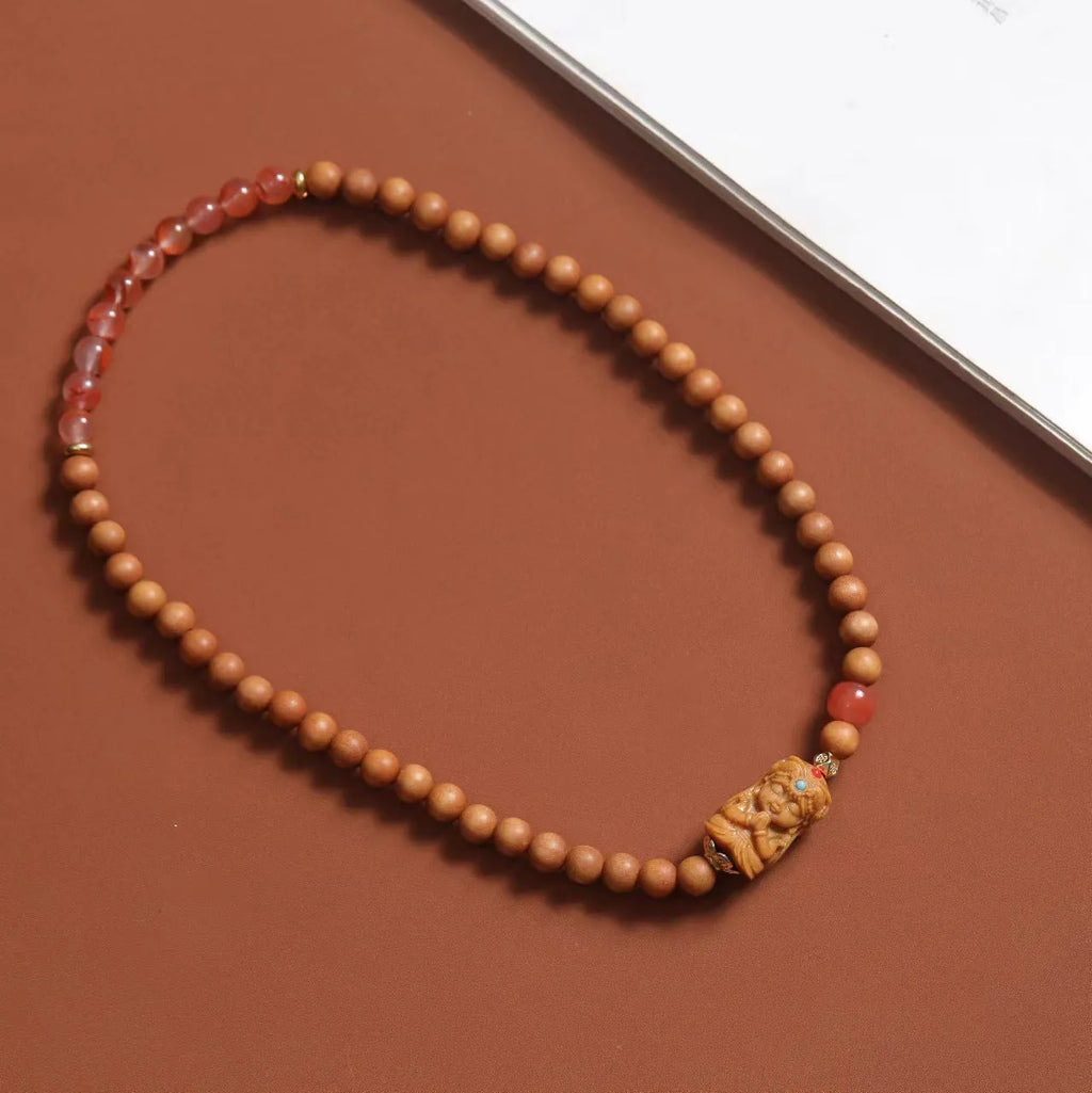 Brown wooden bracelet with South Red Zachilam pattern and double circle design on 6mm beads