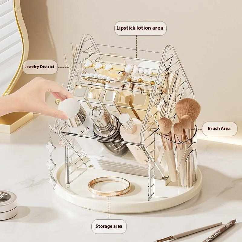 Clear and amber gold rotating plastic cosmetics storage box organiser on a table.