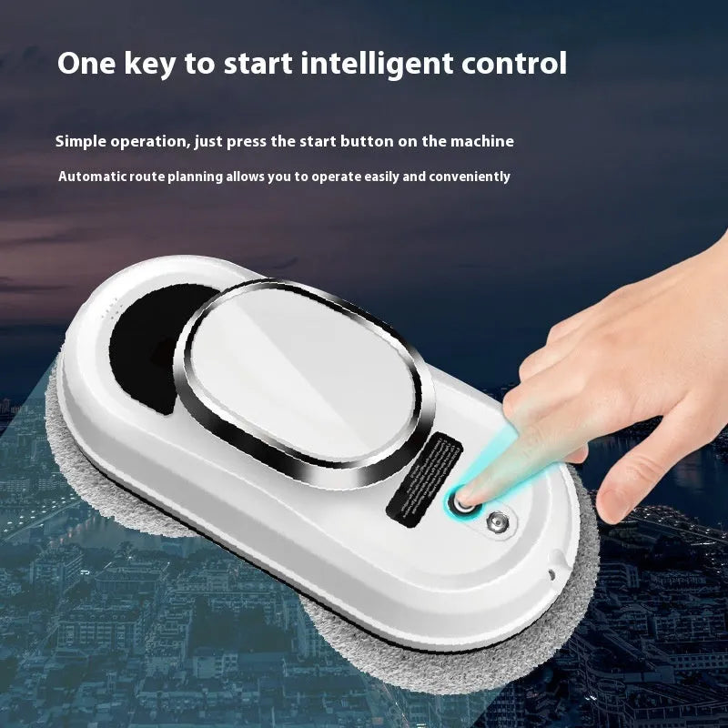 White full-automatic high altitude cleaning machine with remote control on a windowsill.