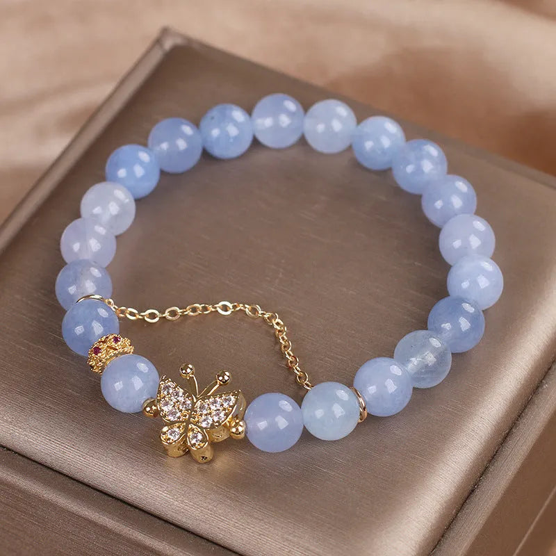 Sky blue aquamarine butterfly crystal bracelet with pearls and rhinestones, 17cm length