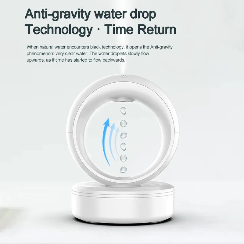 White round anti-gravity air humidifier with levitating water droplets on a desk