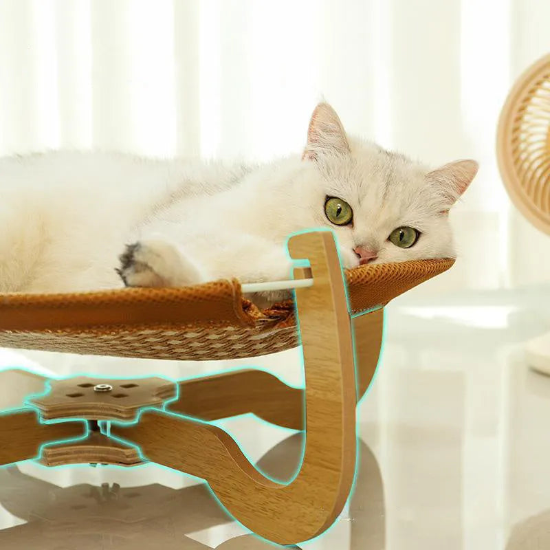 Brown woven rattan square pet hammock bed elevated off the ground.