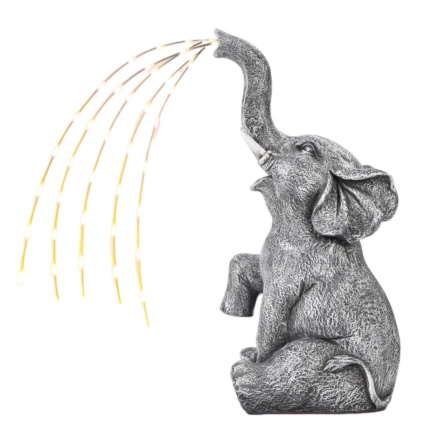 Realistic resin elephant garden statue with integrated LED light strip on grass.