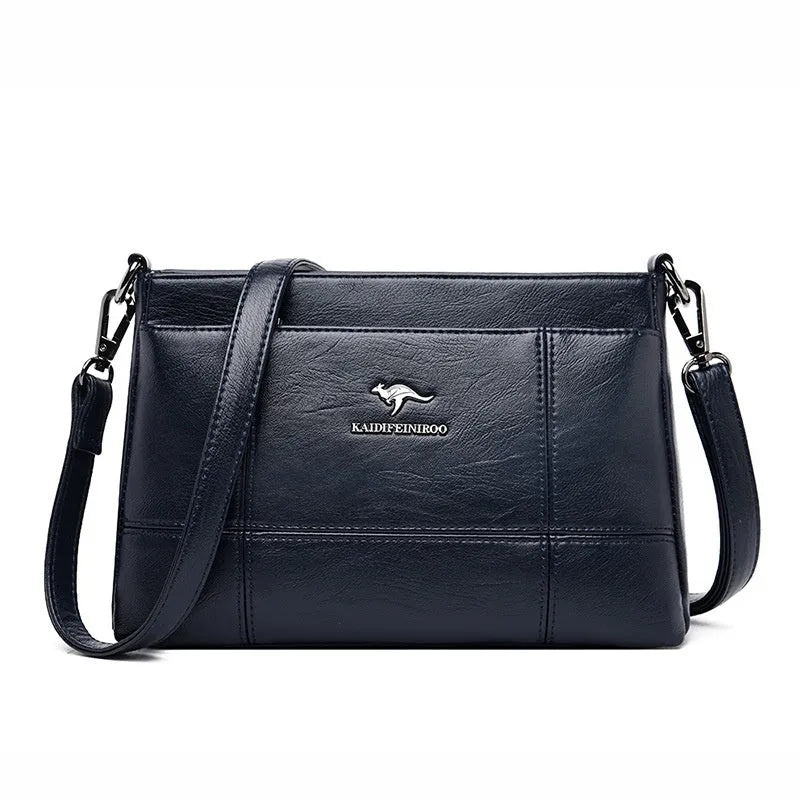 Small square sheepskin shoulder messenger bag with soft handle and double strap in solid colour