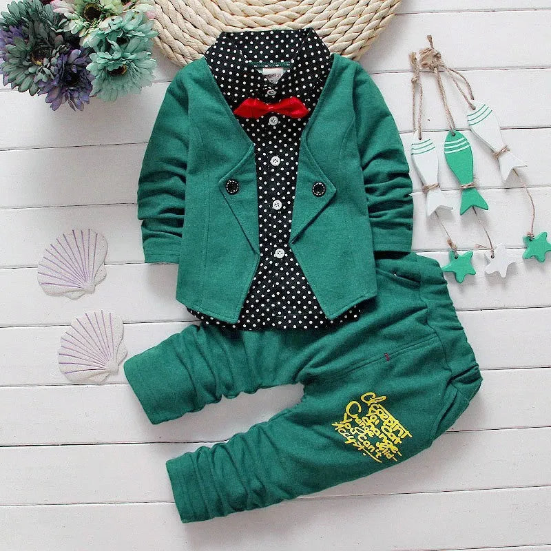 Kids blue cotton blend sport suit set with zip jacket and elasticated waist trousers on a hanger.